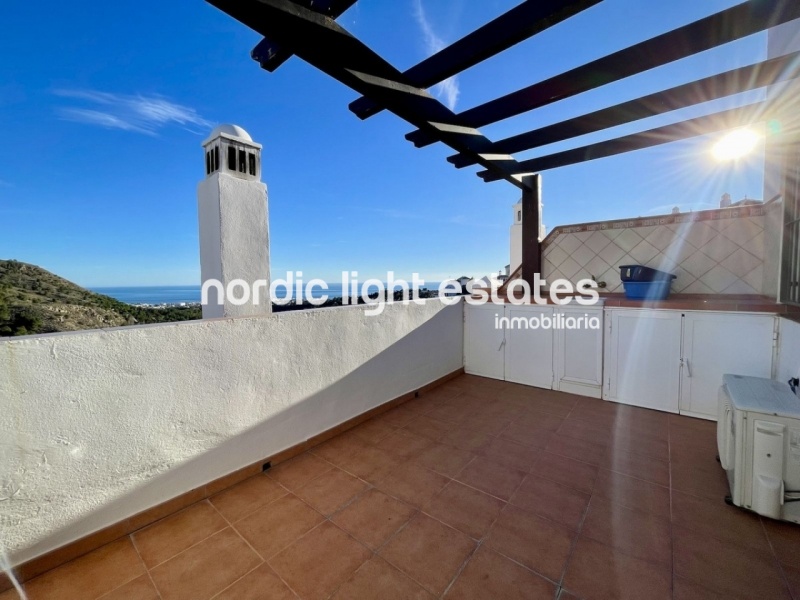 Good sized terraced house with parking space and communal pool in Frigiliana